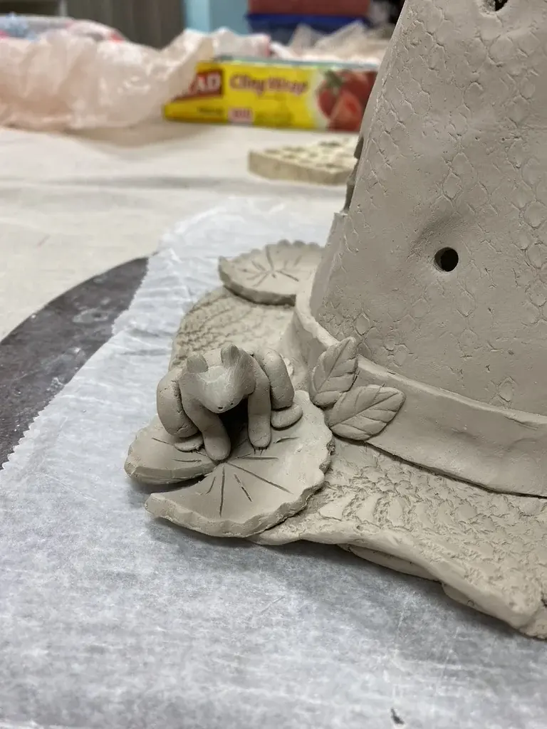 Studio visitor's painted ceramic creation